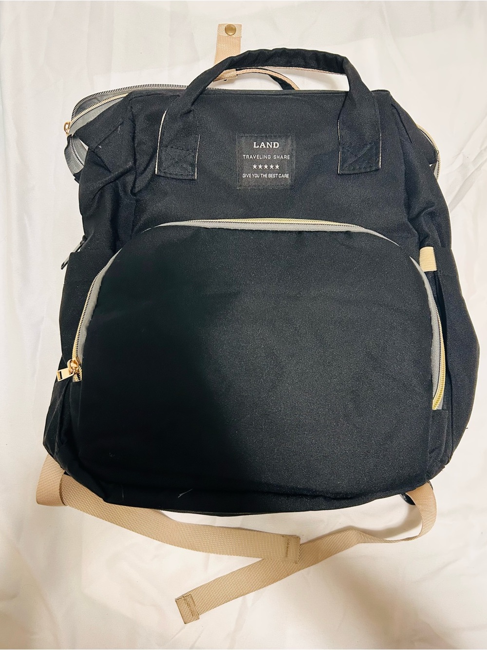 LAND Black Diaper Backpack with Beige Accents and Gold Zippers